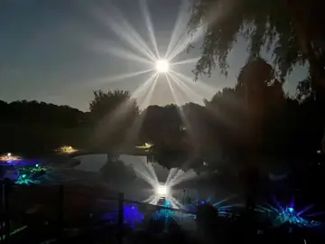 X Logo Spin Animation Over Pool